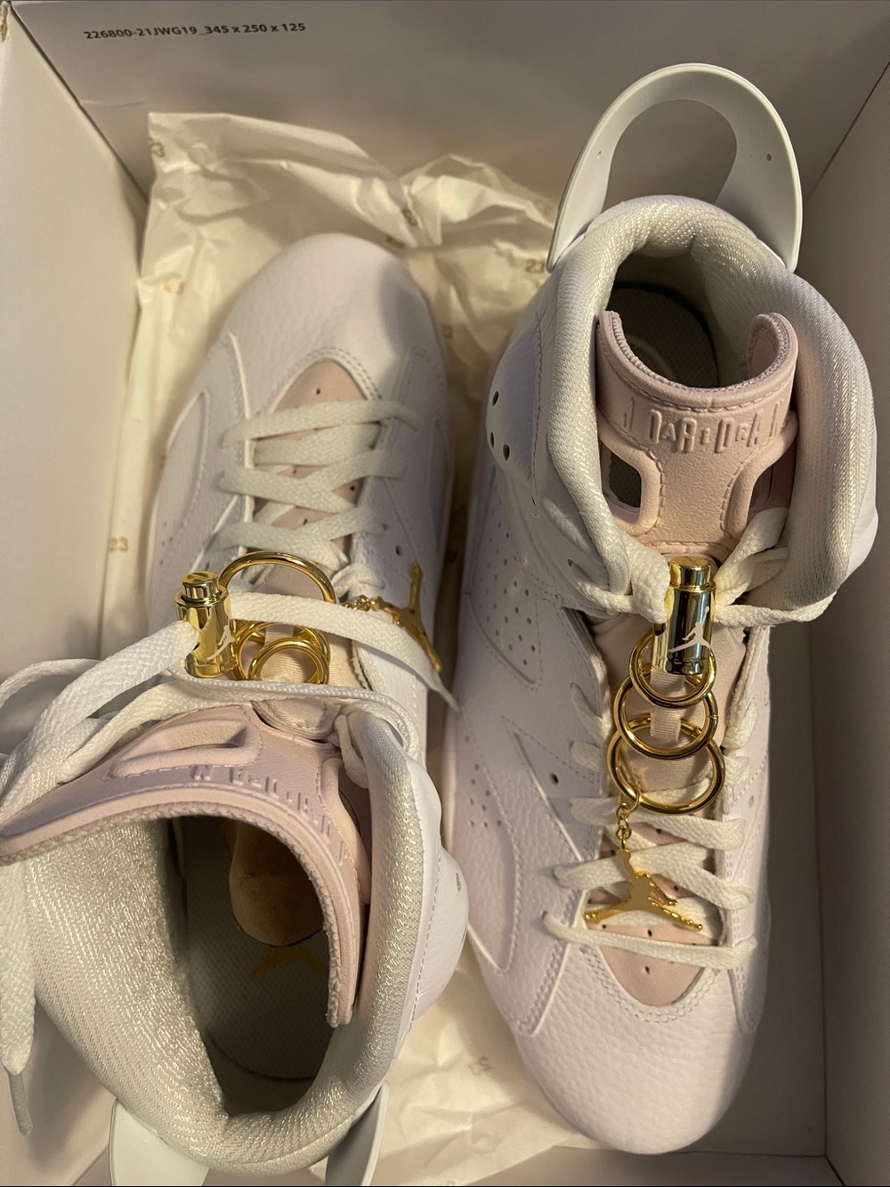 Jordan Women's White and Light Pink High-Top Sneakers with Gold Hardware